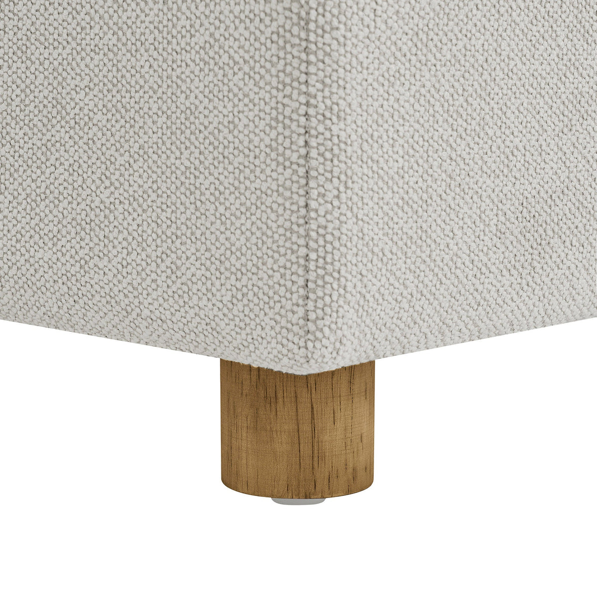 Henredon Sona Fabric Storage Ottoman wood leg and fabric texture closeup