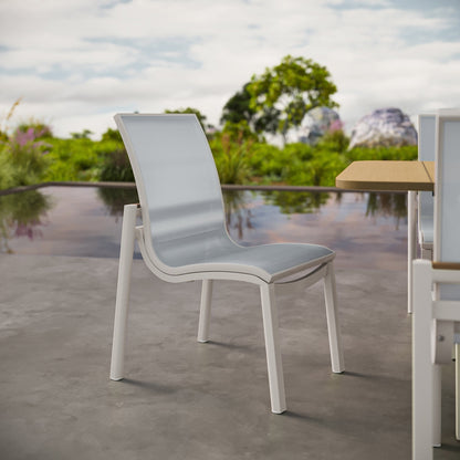Single Agio Morien sling dining chair shown close-up, white aluminum frame with light gray Phifertex fabric