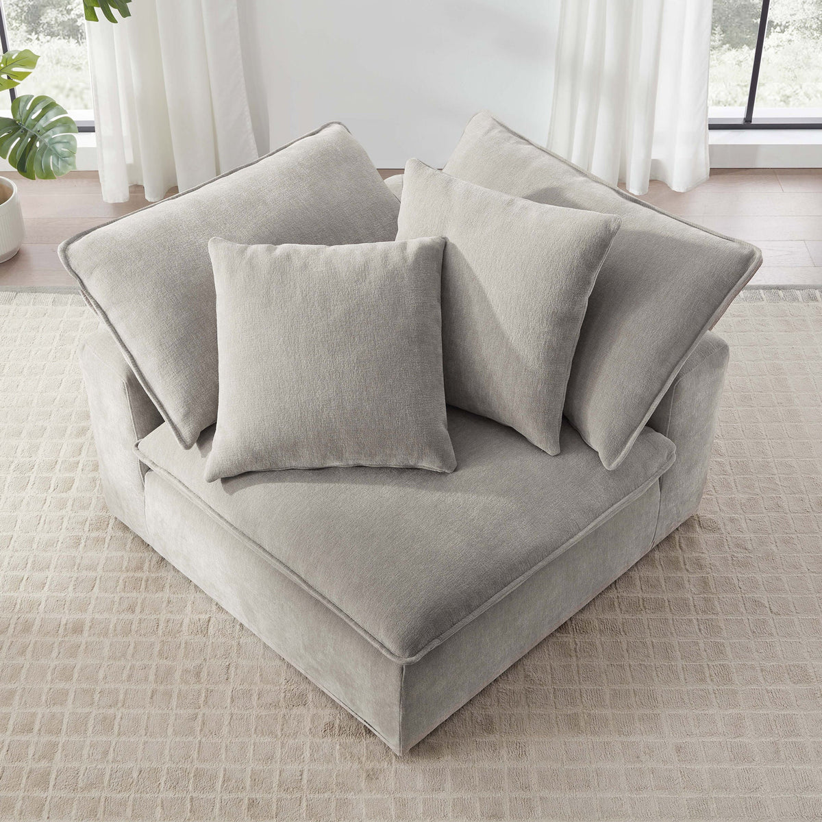 Aiden & Ivy Sereen Fabric Corner Chair with pillows, high angle view
