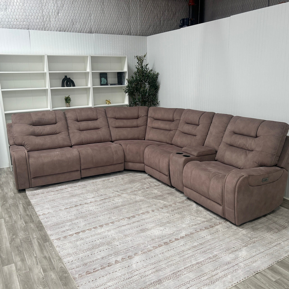 Barcalounger Carmelo brown fabric power reclining sectional, front angled view in a living room setting