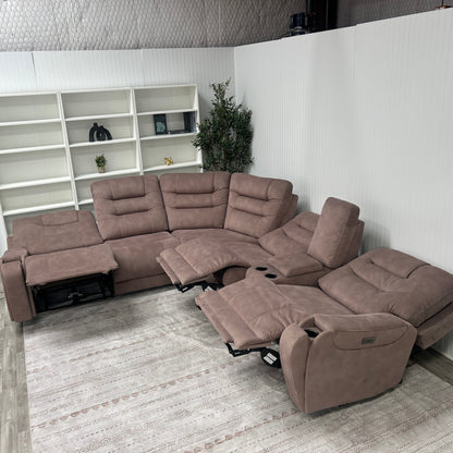 Sectional with multiple recliners extended, showing the power reclining and zero-gravity footrest function