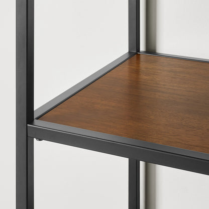 Detail of Pierson bookcase shelf corner showing brown acacia veneer set in a black powder-coated steel frame