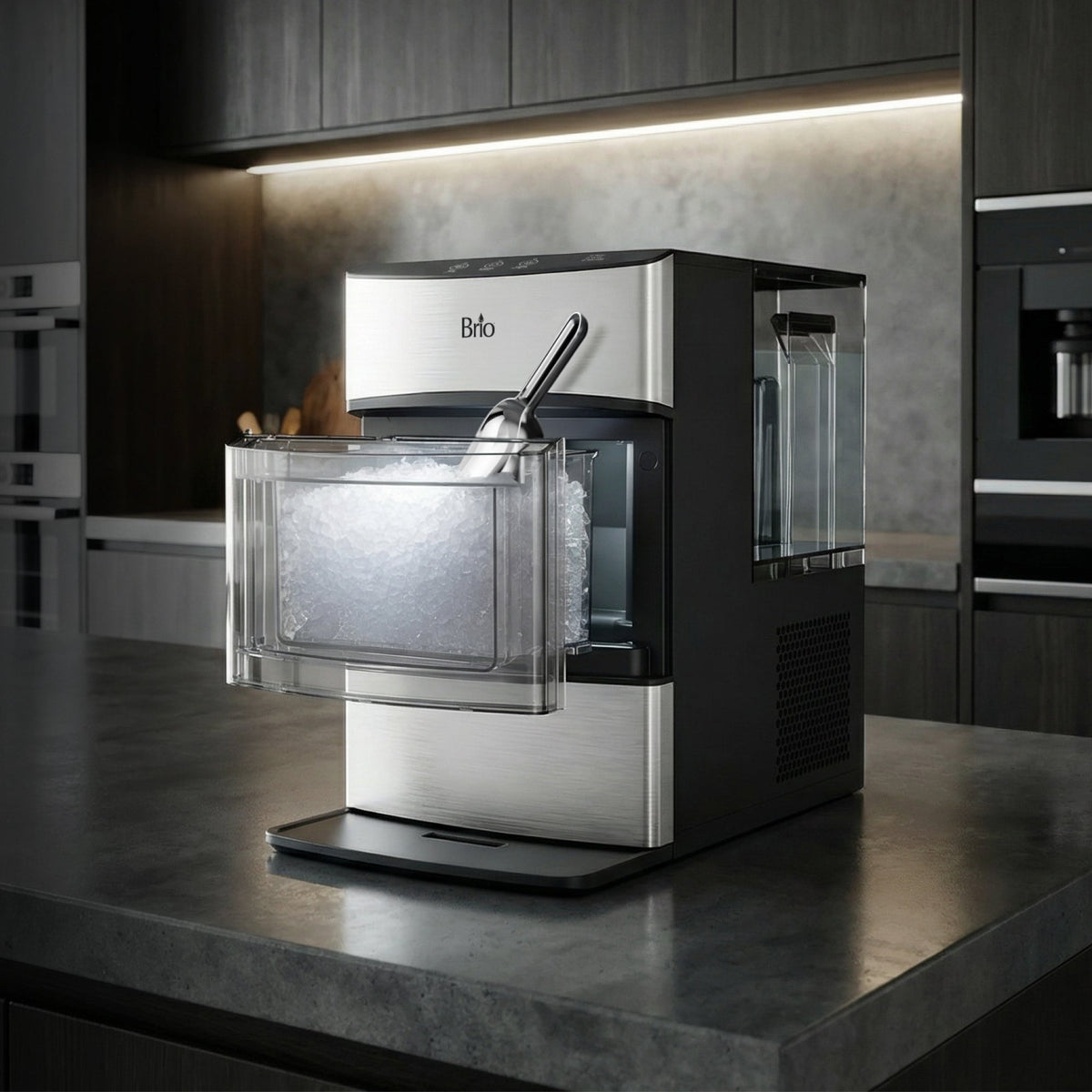 Brio 740i ice maker on a modern kitchen island with the ice bin door open