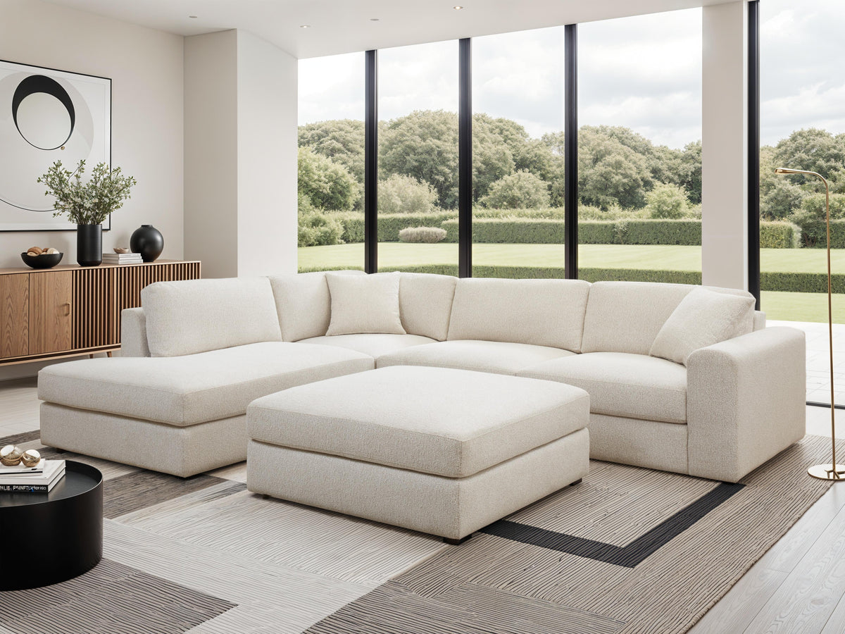 Andee sectional with ottoman shown from a different angle in the same living room setting