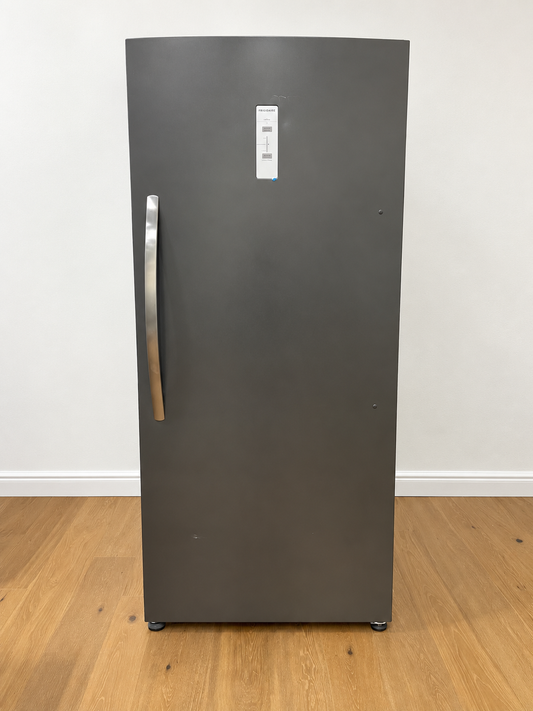 A tall, dark gray refrigerator with a vertical handle.