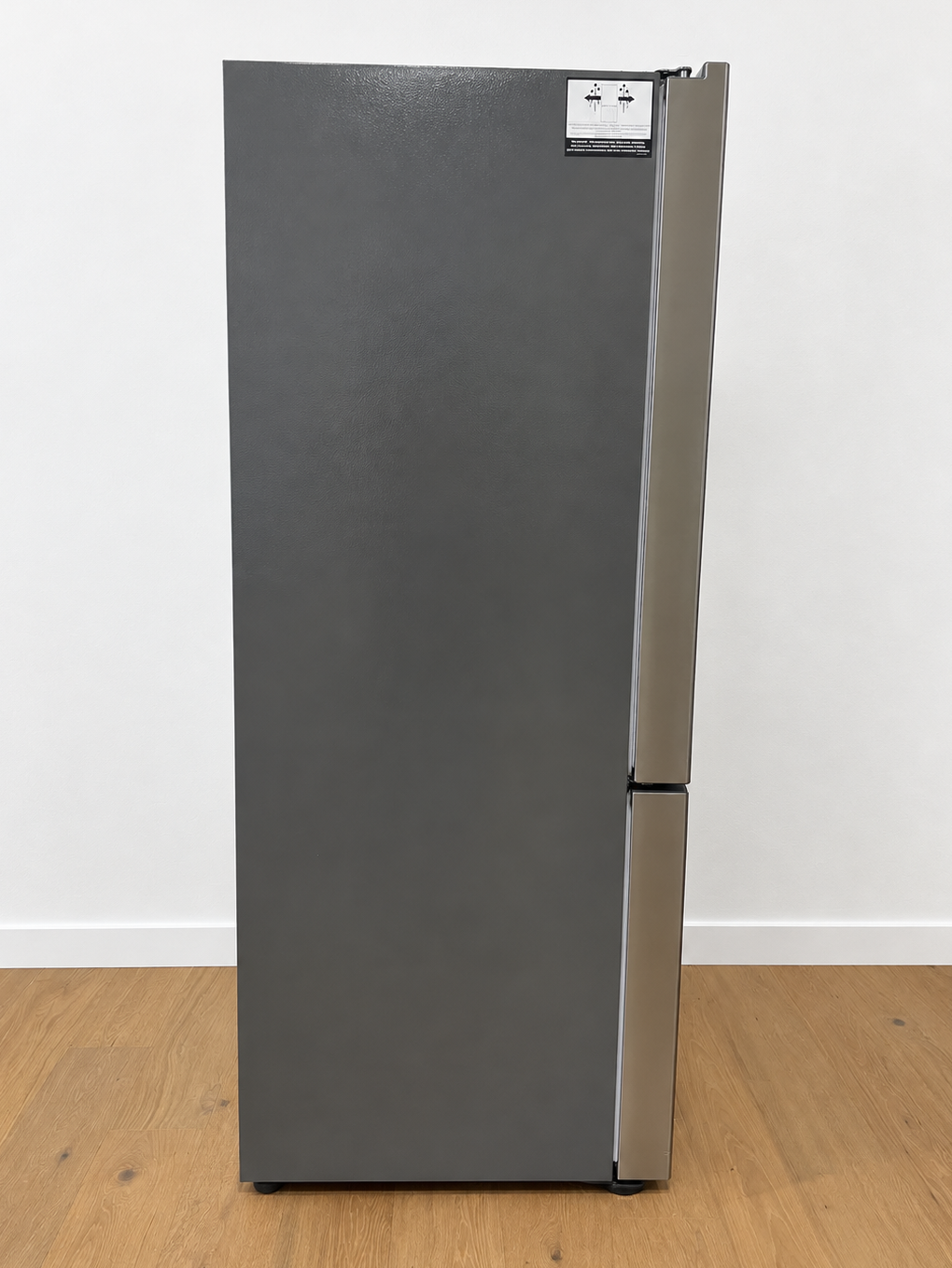 Side angle view of the actual unit showing the door edge and rating label