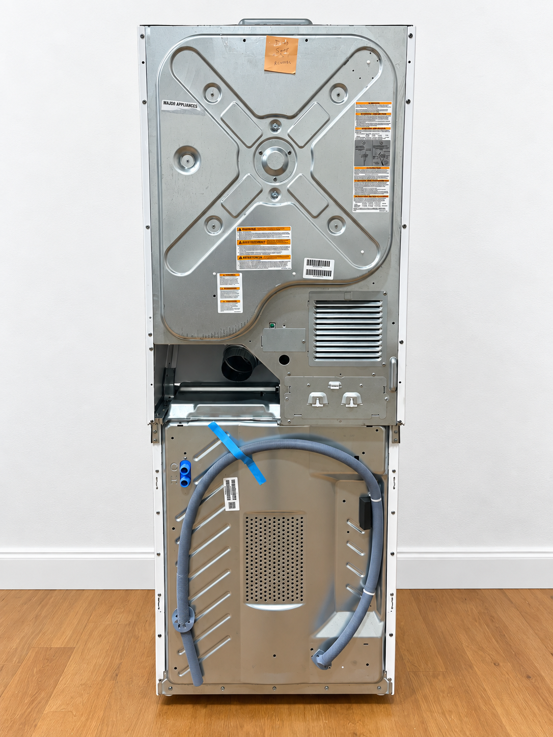 Frigidaire FLCE7522AW Electric Laundry Center rear panel showing vent and hose connections