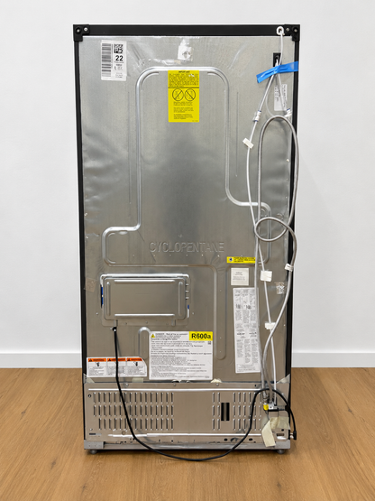 Back panel of the actual unit showing the compressor area, Cyclopentane marking, and R600a warning label