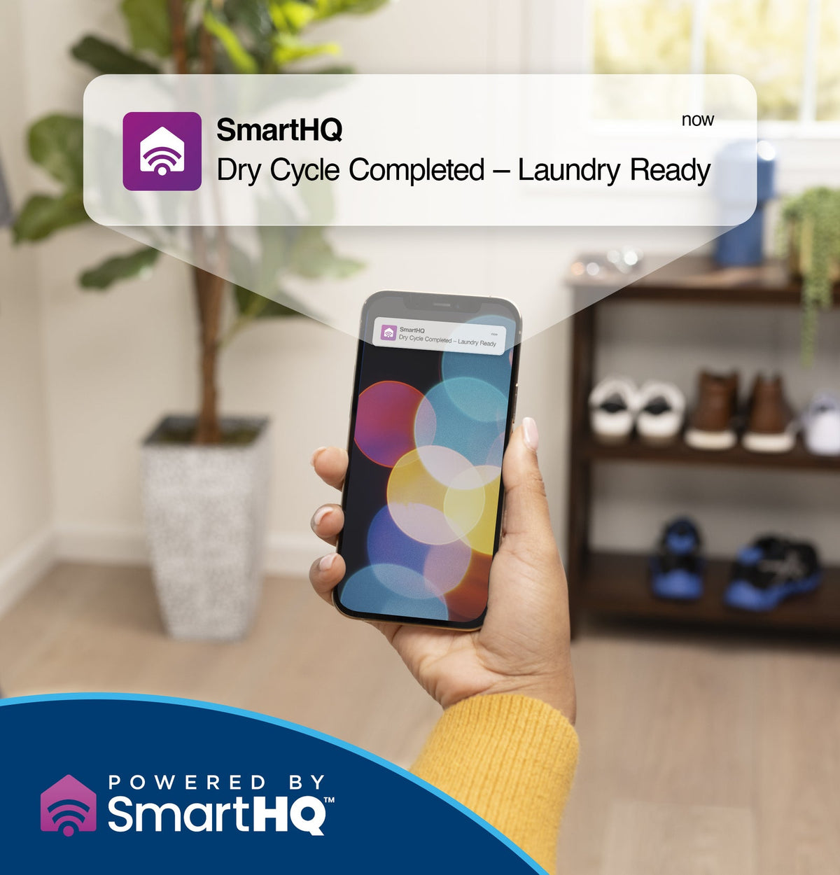 Smartphone showing a SmartHQ app notification that the dry cycle is complete