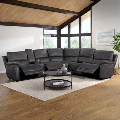 Gilman Creek Wylder leather power reclining sectional in a living room with vaulted wood ceiling and a round coffee table