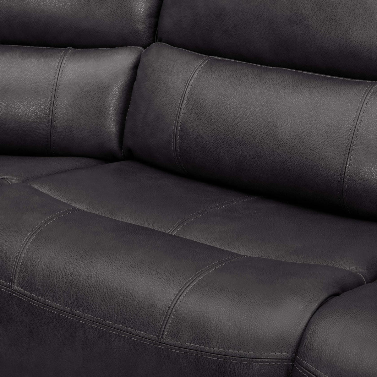 Close-up of the genuine top-grain leather upholstery texture and stitching