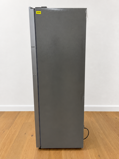 Side view of the actual unit, closed door, with a yellow Tested quality-control sticker near the top hinge