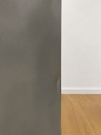 Close-up of the actual unit's door seam and side panel