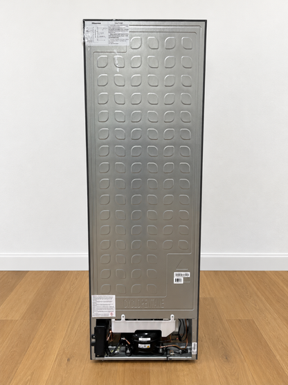 Back panel of the actual unit showing the compressor, Cyclopentane marking, and rating label