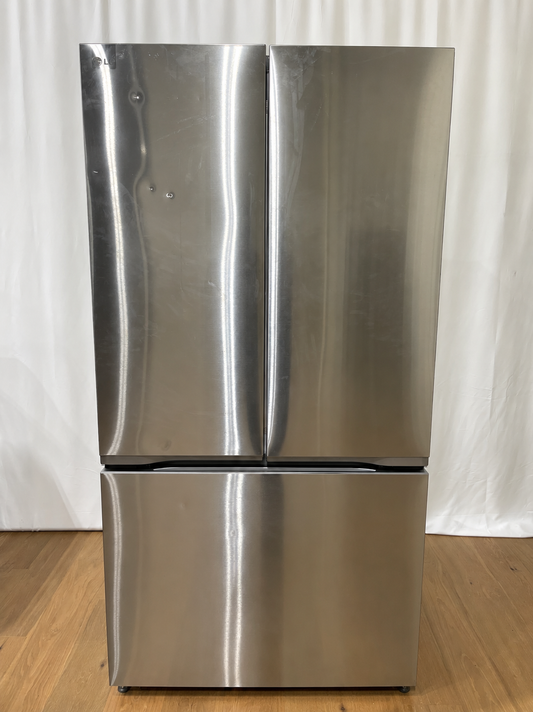 A stainless steel French door refrigerator with a bottom freezer drawer.