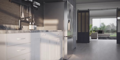 Lifestyle shot of the stainless steel refrigerator with a door slightly open in a modern loft-style kitchen with dark cabinetry and barn doors