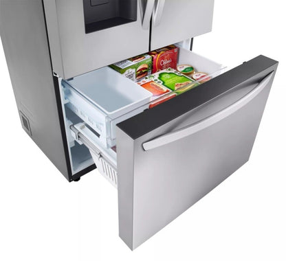 Bottom storage drawer open and stocked with packaged food, showing the pull-out organizer bin