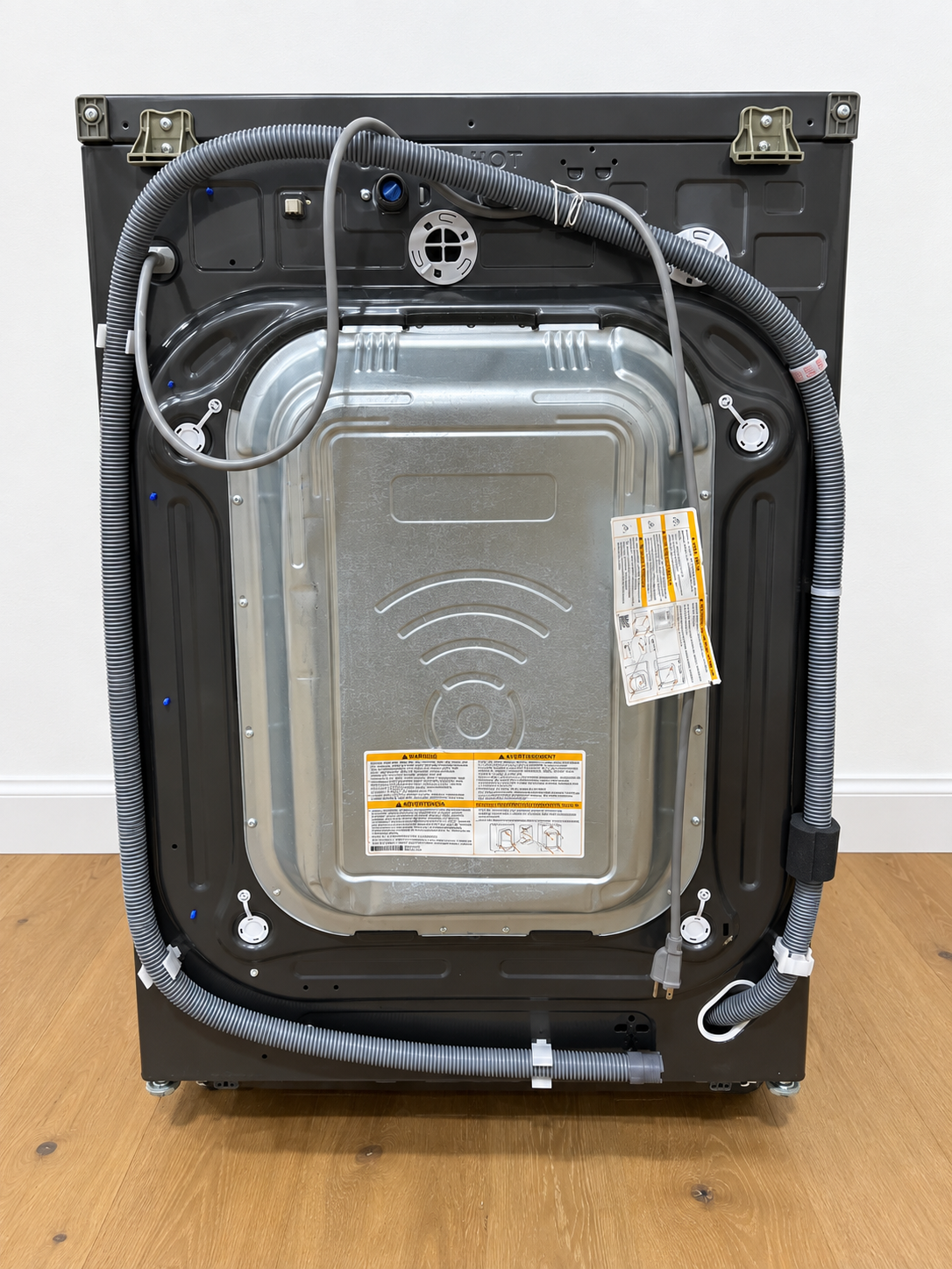 Back panel of the actual unit showing hose connections and power cord