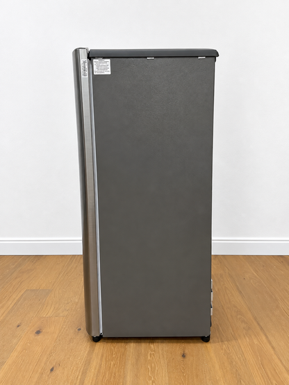 A compact top-freezer refrigerator in a dark gray finish with a silver vertical handle.