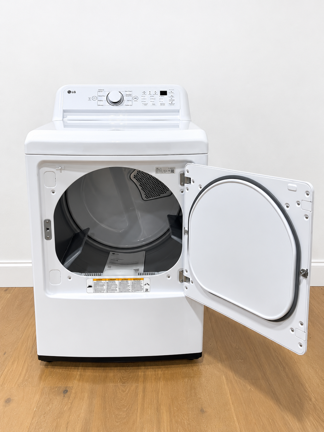 Actual unit with door open showing the empty drum