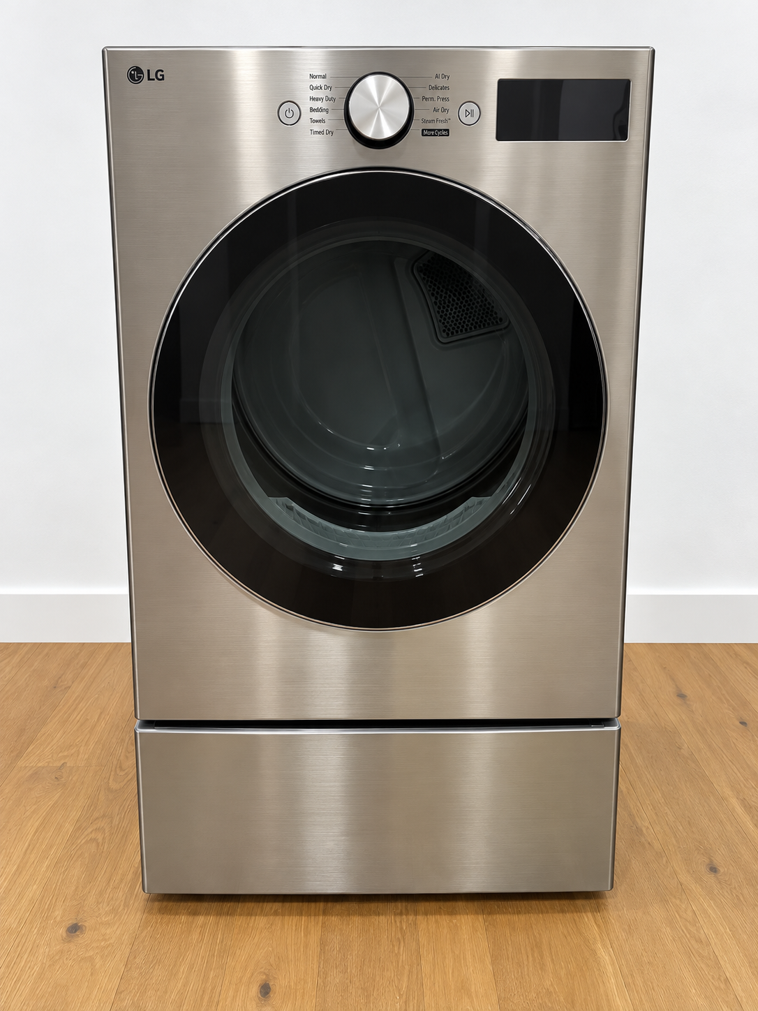Actual unit: LG DLEX5800V 7.4 cu ft electric dryer in graphite steel, front view, shown on a storage pedestal