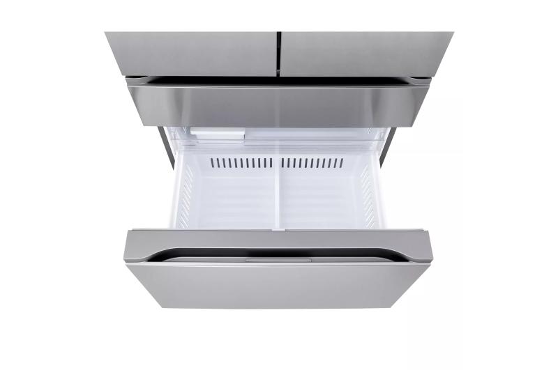 Top-down view of the open freezer drawer showing the interior tray and ridged surface