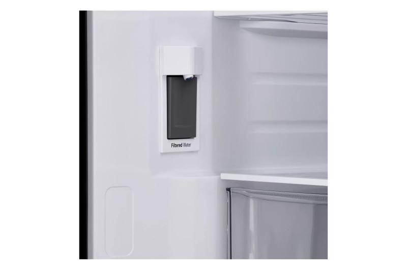 Close-up of the internal filtered water dispenser located inside the refrigerator compartment