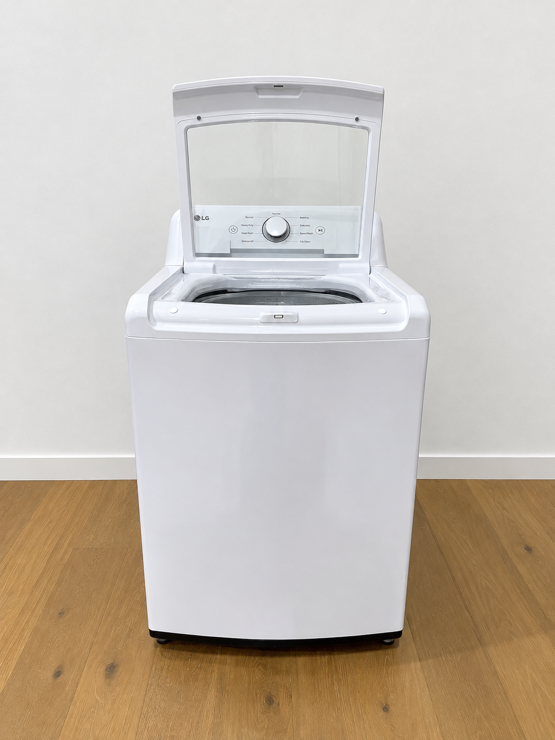 LG WT7005CW front view with lid open showing wash basin