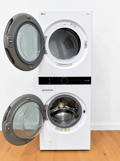 LG WKE100HWA WashTower with both dryer and washer doors open showing empty drums