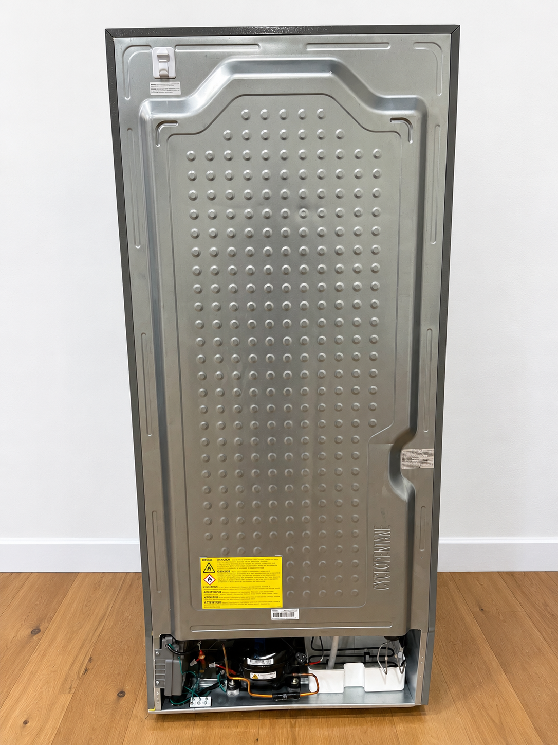 Midea MRB19B7AST rear panel showing compressor