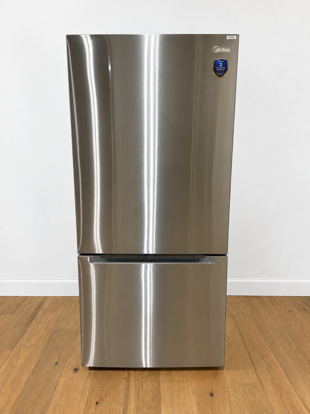 Midea MRB19B7AST stainless steel bottom freezer refrigerator front view