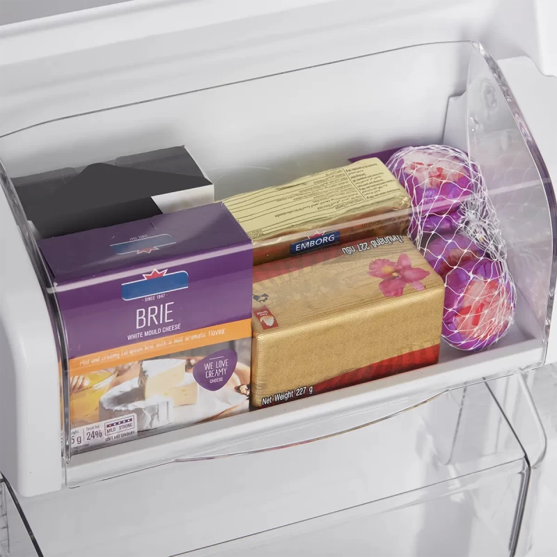 Midea MRT21D3BWW refrigerator door bin close up with food items