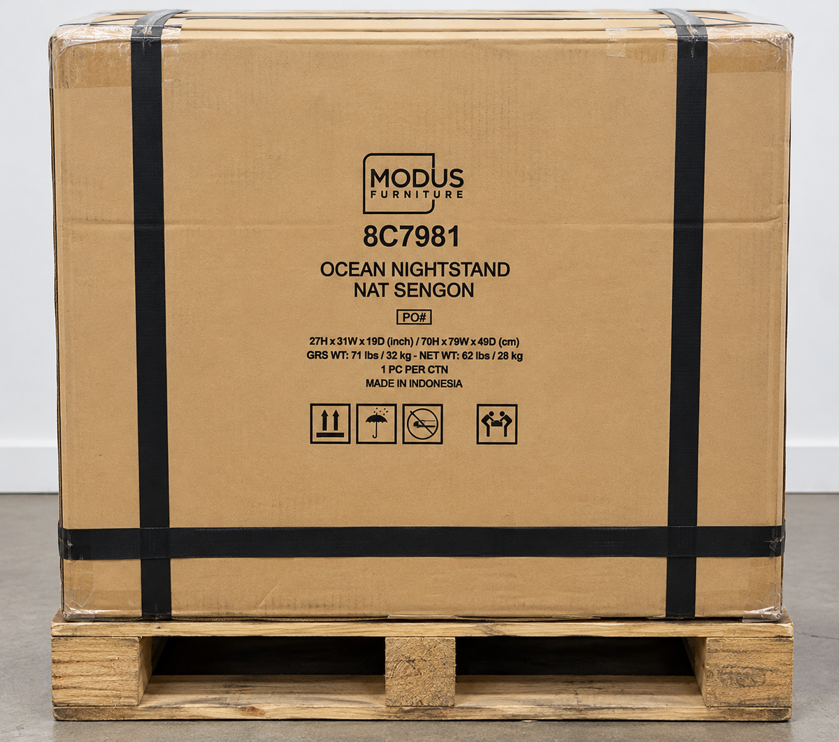 Modus Furniture shipping box labeled 8C7981 Ocean Nightstand Nat Sengon on a wooden pallet