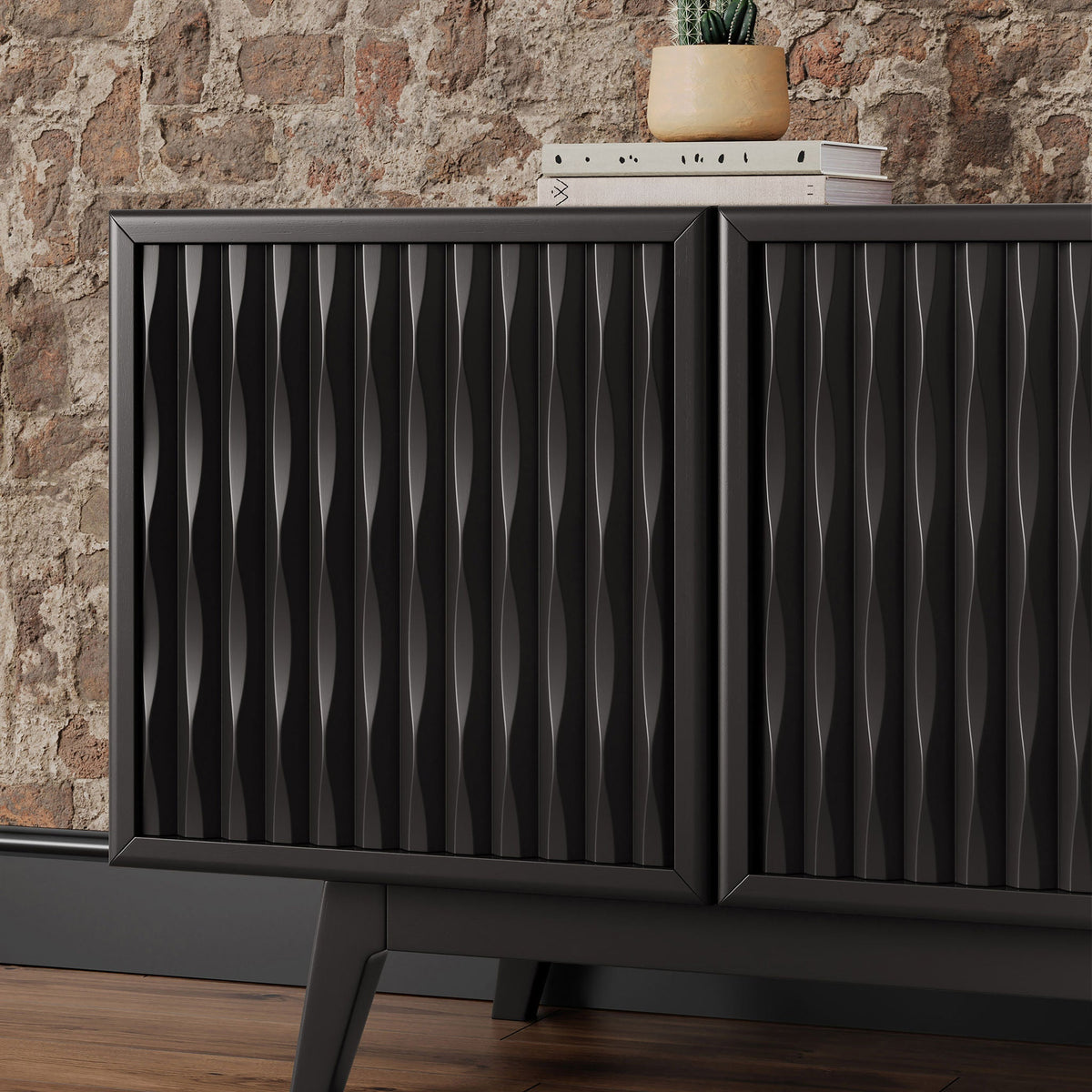 Close-up of the Del Rey Oaks console black wave-carved overlay veneer door fronts