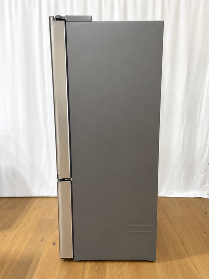 A tall, dark gray refrigerator with stainless steel handles.