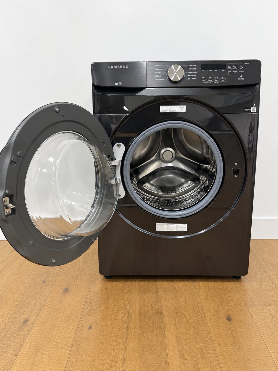 Samsung WF45T6000AV front view with door open showing drum