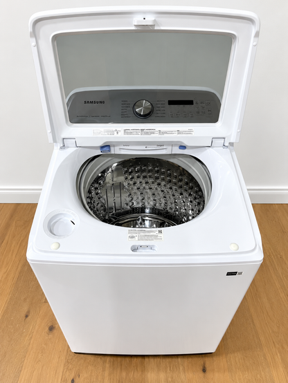 Actual unit with lid open showing the empty stainless steel tub