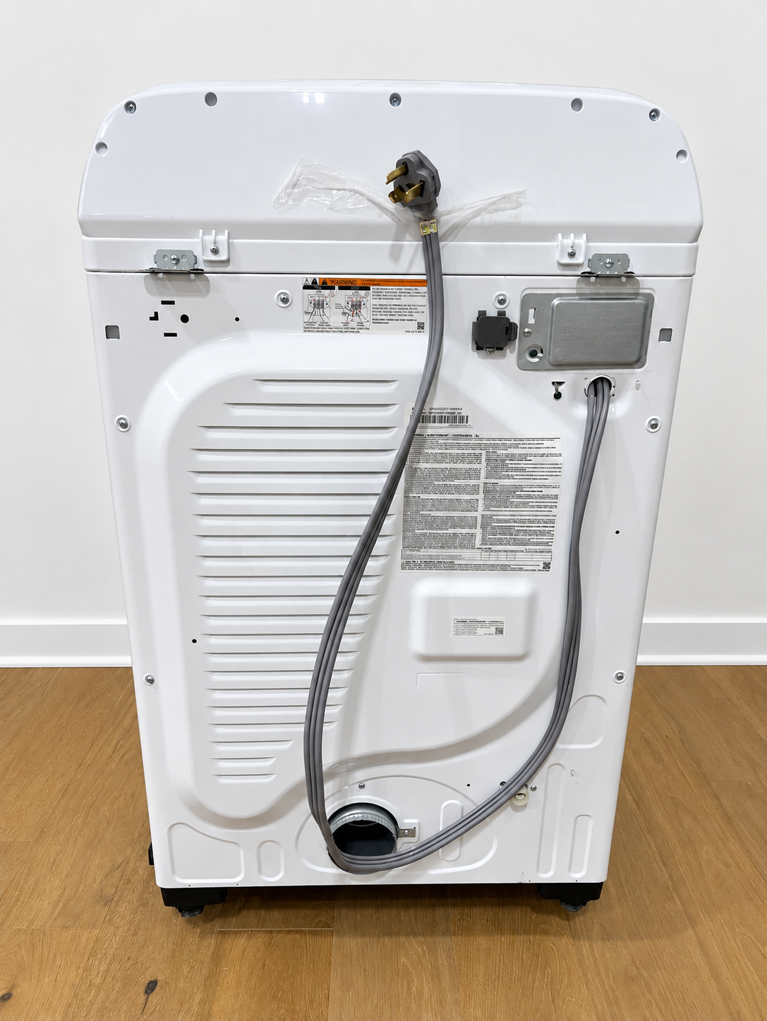 Back panel of the actual unit showing power cord and vent connection