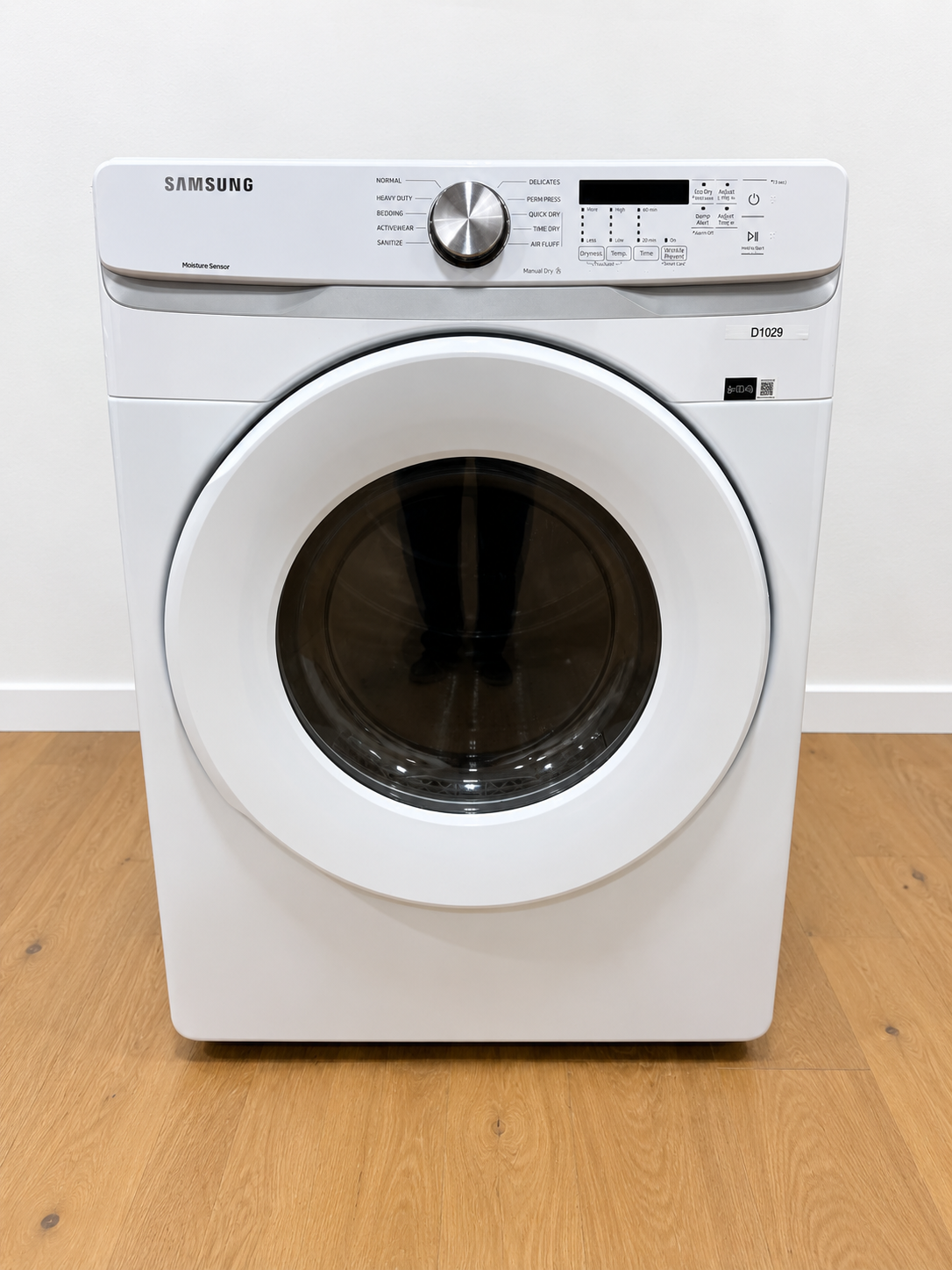 Samsung DVE45T6000W dryer front view with moisture sensor control panel
