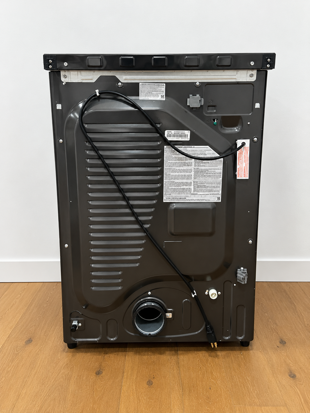 Samsung DVG53BB8700V rear panel showing model label and power cord