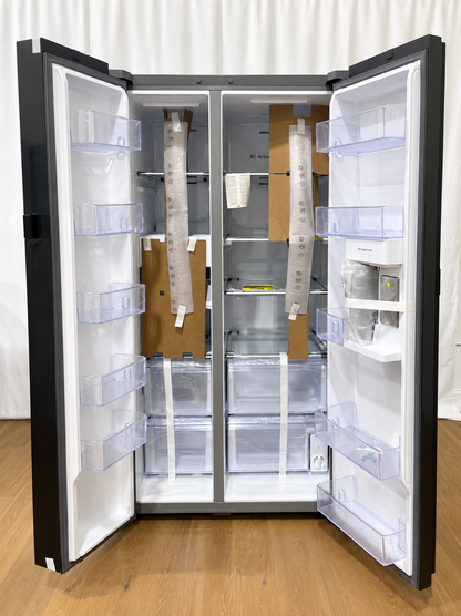 Interior view of the Samsung Bespoke refrigerator with both doors open showing shelving and Beverage Center water dispenser