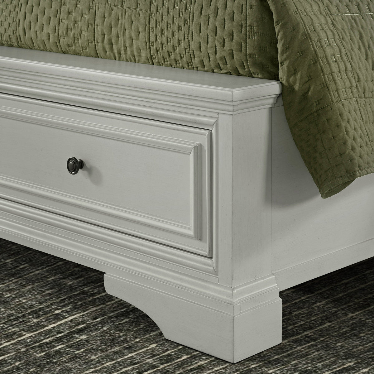 Universal Broadmoore Anistyn Queen Storage Bed footboard drawer corner closeup